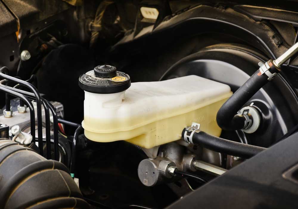 brake fluid reservoir that uses a liquid level sensor