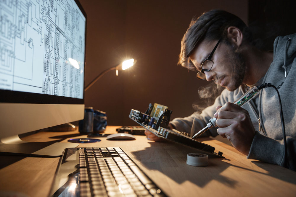 A Man soldering