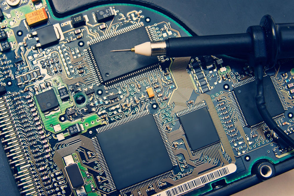 An Oscilloscope Probe on an Electronic circuit