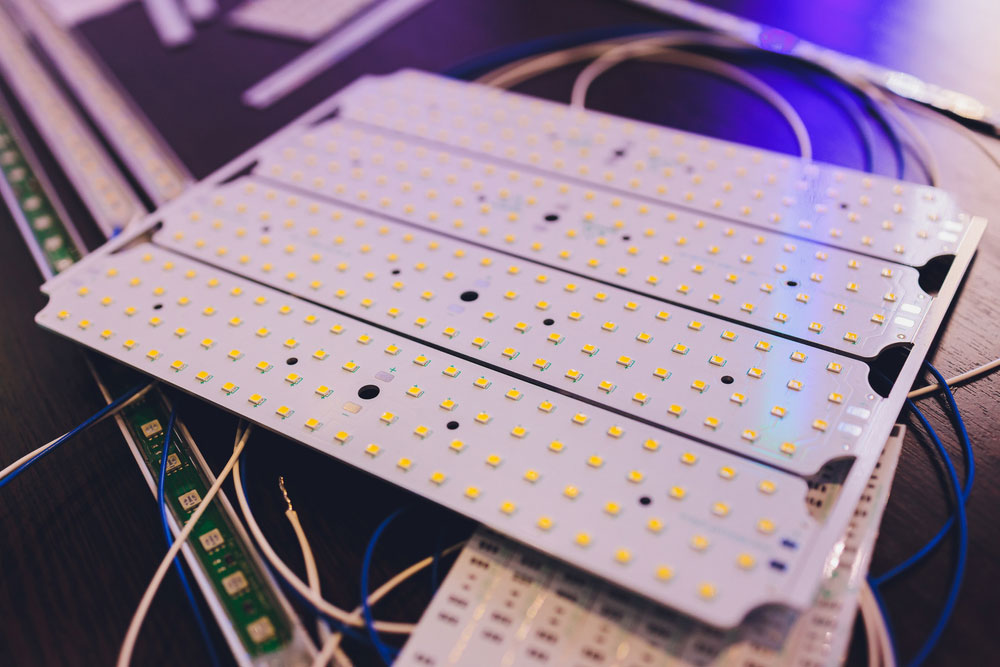 Silicone coating on an aluminum PCB for LED strip lights